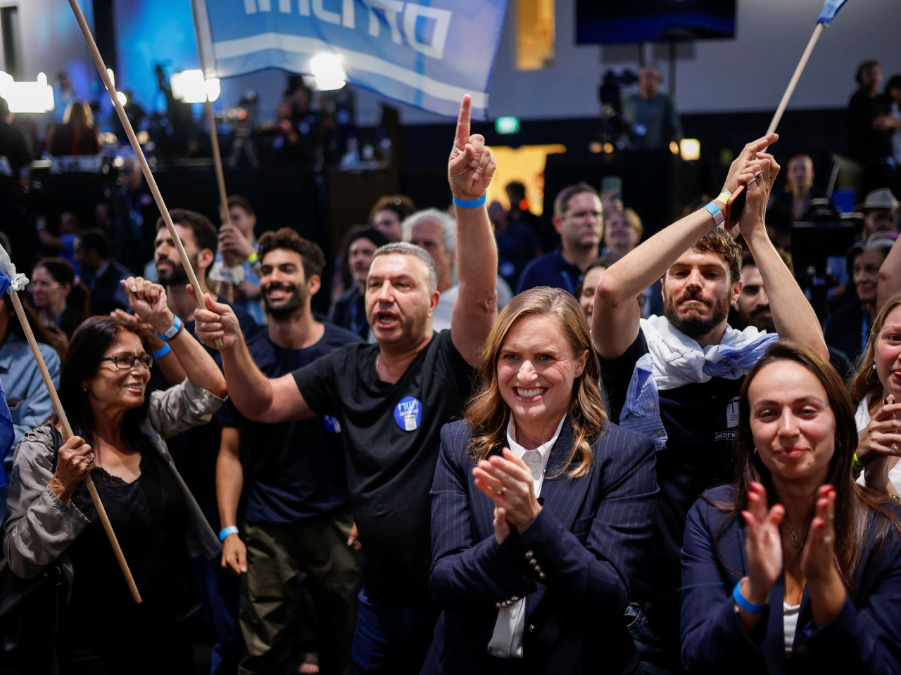 Supporters of Gadi Eisenkot, leader of the Yashar party, react to the exit poll showing his bloc held a two-seat edge over Benjamin Netanyahu's Likud camp. Photo: Reuters
