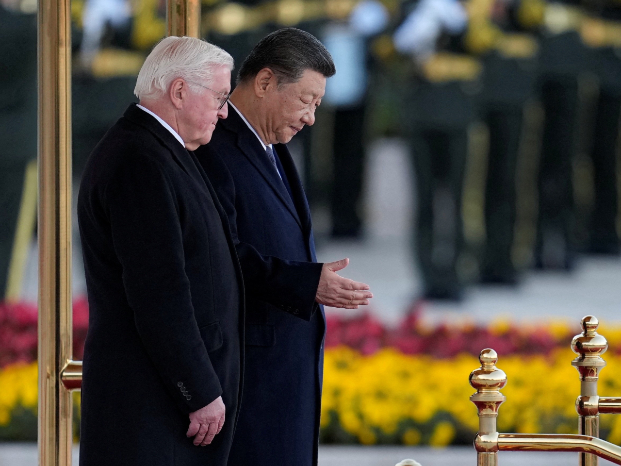 Presidents Xi Jinping and Frank-Walter Steinmeier attend a welcoming ceremony outside the Great Hall of the People in Beijing. Photo: Reuters